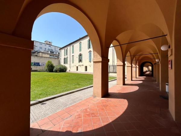 A la foto es mostra l'objecte La corte di San Domenico situat a la ciutat de Pisa.