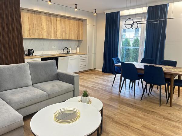 A la foto es mostra l'objecte Apartament Sosnowy przy Basenach Tropikalnych, prywatny parking situat a la ciutat de Kielce.