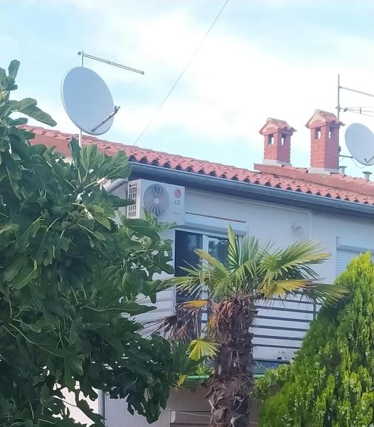 A la foto es mostra l'objecte Apartments with parking space Kosinozici, Porec - 23146 situat a la ciutat de Poreč.