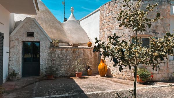 Na fotografii je vidět objekt Trulli l’Olivo Casa Vacanze nacházející se ve městě Masseria Orimini.