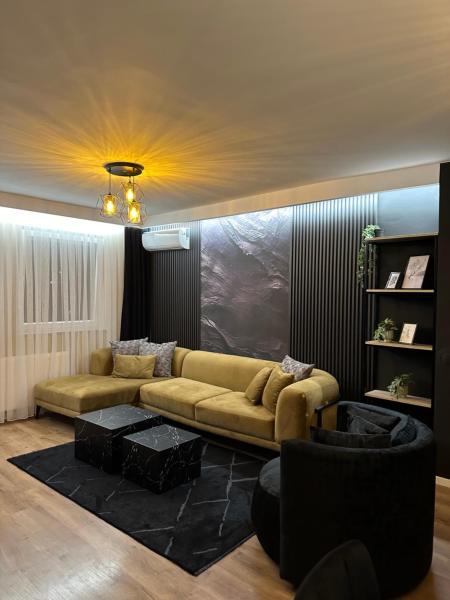 The photo shows the TOP_APARTMENTS located in the city of Pristina.