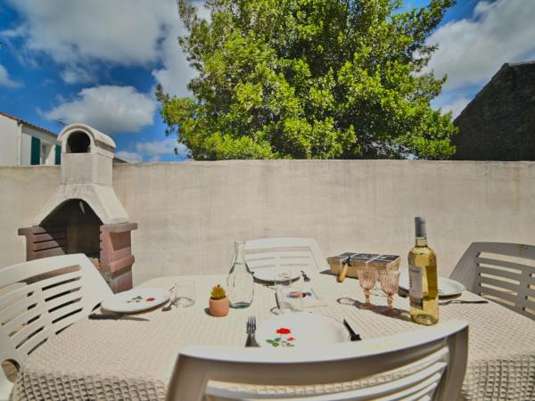The photo shows the Holiday Home Althea by Interhome located in the city of Saint-Pierre-dʼOléron.