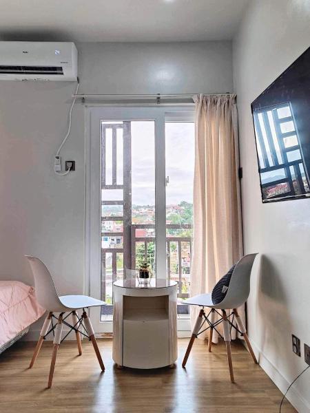 A la foto es mostra l'objecte Antara Residence Studio Condo situat a la ciutat de Talisay.