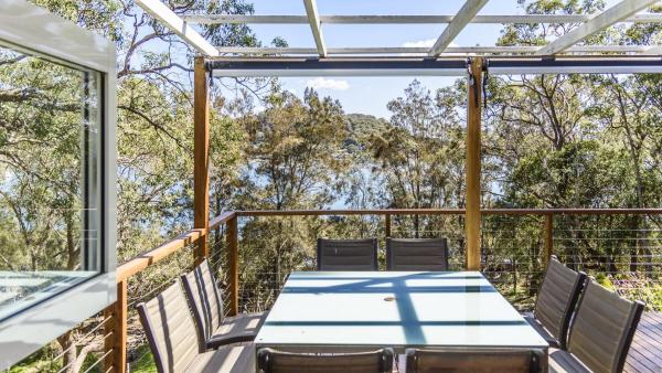 Na foto é possível ver o objeto 'The Cottage At Pretty Beach' by HolidayCo localizado na cidade de Pretty Beach.