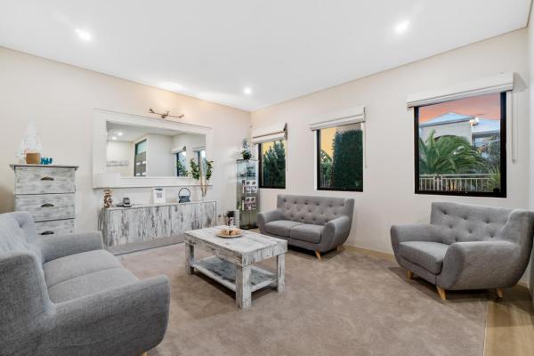 The photo shows the Beachside Bliss 1BR Mindarie located in the city of Mindarie.