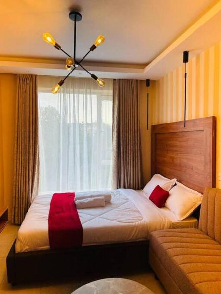 A la foto es mostra l'objecte Stylish Studio with Pool situat a la ciutat de Kiambu.