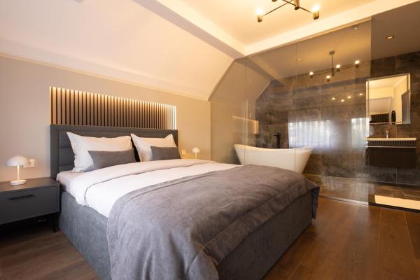 The photo shows the Prishtina City Apartments located in the city of Pristina.