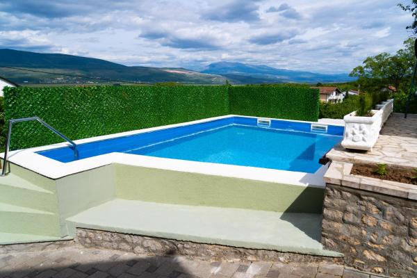 A la foto es mostra l'objecte Holiday Home IFI situat a la ciutat de Mostar.