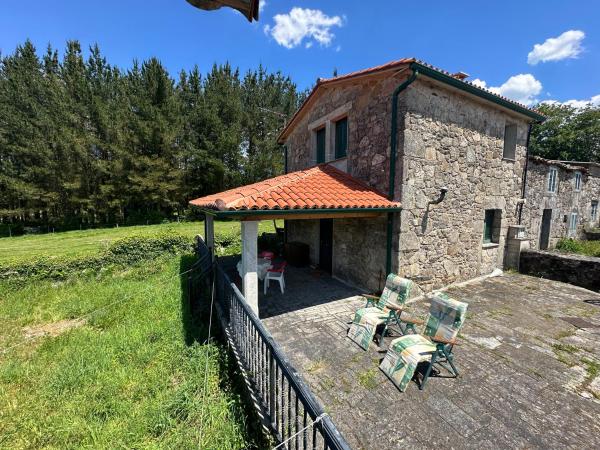 Op de foto is het object Increíble Casita Gallega. te zien, gelegen in de stad Pidre.