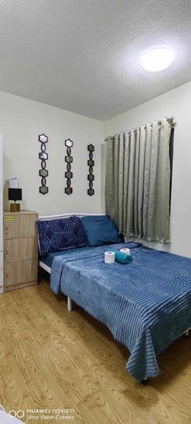 A la foto es mostra l'objecte MRG Place San Remo Oasis Condo situat a la ciutat de Talisay.