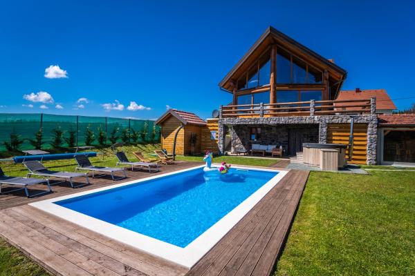 Na zdjęciu widoczny jest obiekt Log home Mountain Mama położony w mieście Hlevci.
