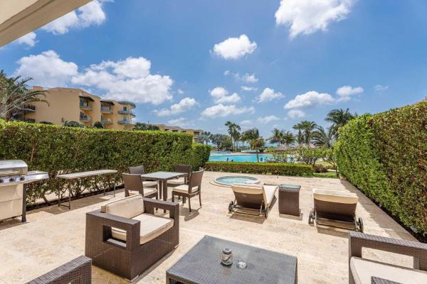 Beachfront - View Garden 2BR condo - A145, Palm-Eagle Beach