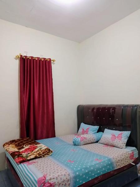 A la foto es mostra l'objecte Simbolon Homestay Samosir situat a la ciutat de Silimapuluh.