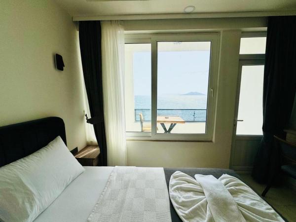 The photo shows the Sea Door Hotel located in the city of Fethiye.