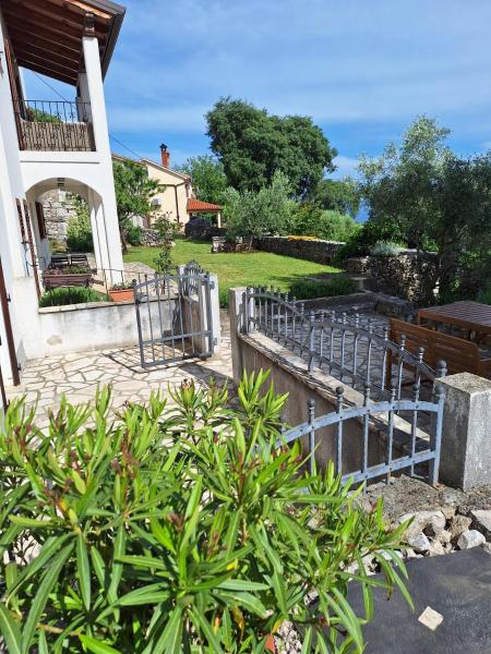 The photo shows the House Marica located in the city of Rabac.