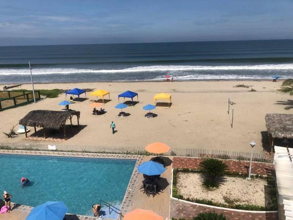 The photo shows the Dept en Playas Sol Arena Mar y Piscina located in the city of Playas.