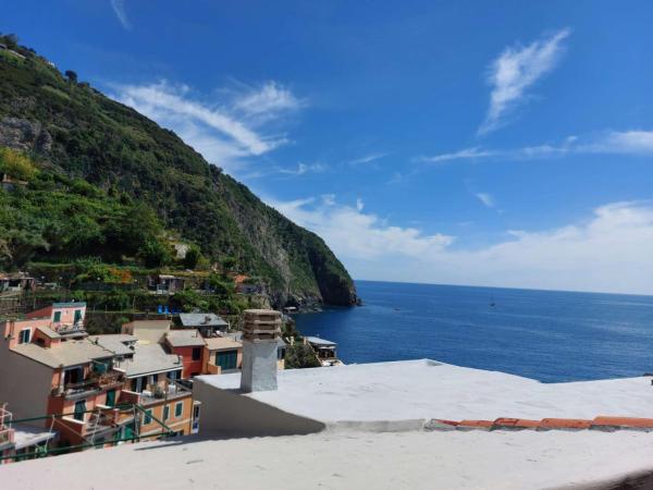 A la foto es mostra l'objecte Casa Castello Riomaggiore situat a la ciutat de Riomaggiore.