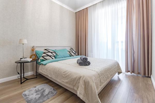 A la foto es mostra l'objecte Уютная квартира со свежим ремонтом на левом берегу situat a la ciutat de Taldykolʼ.