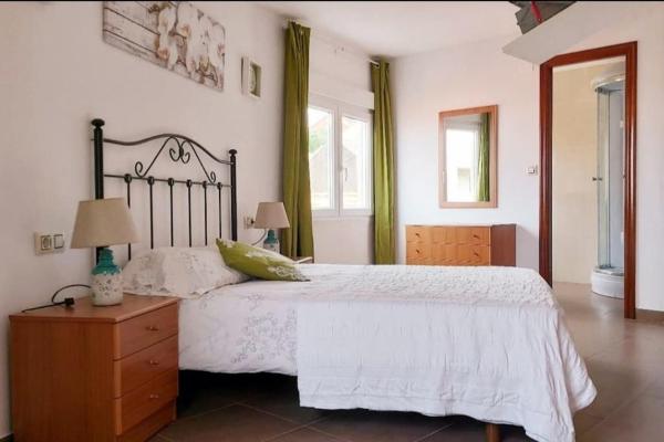 A la foto es mostra l'objecte Casa roja situat a la ciutat de Camariñas.