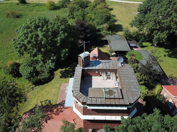 A la foto es mostra l'objecte Ferienhaus Turm360, FeWo Vermittlung Nordsee, C Hüppeler situat a la ciutat de Varel.