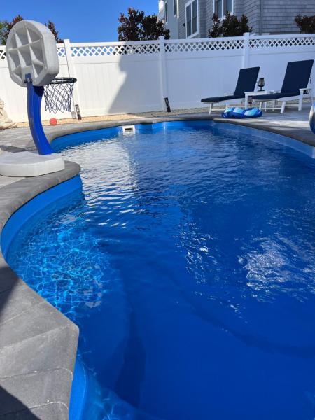 A la foto es mostra l'objecte LBI - Pool Hot Tub Beach Block Pet Friendly NEW CONSTRUCTION situat a la ciutat de Long Beach.