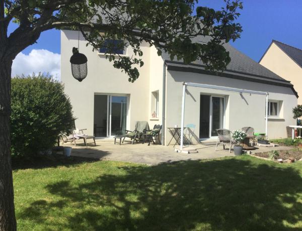 Maison dans un écrin de verdure