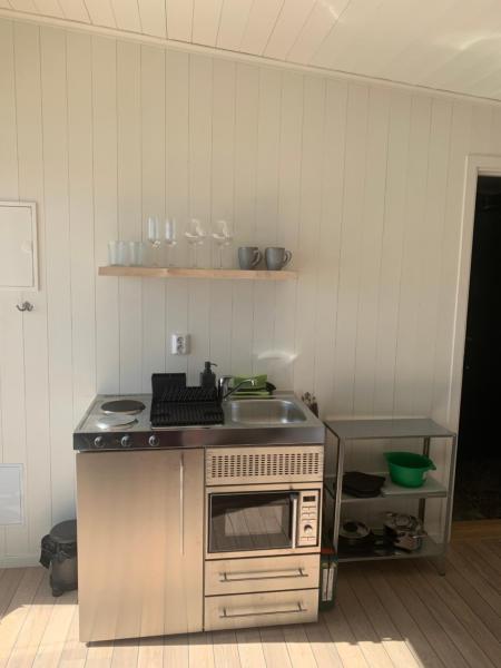 A la foto es mostra l'objecte Bryggstuga med privat bastu situat a la ciutat de Arholma.