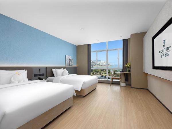 La photo montre l'objet Country Inn & Suite by Radisson, Chongqing Wanzhou Wanda Plaza situé dans la ville de Wanzhou.
