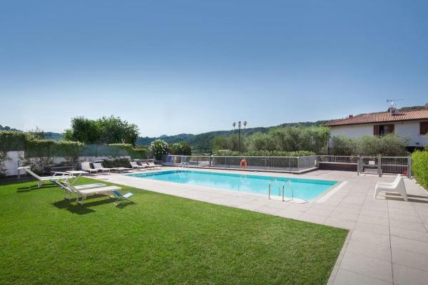 På bildet vises objektet Casa Alex-Con piscina e vista lago som ligger i byen Garda.