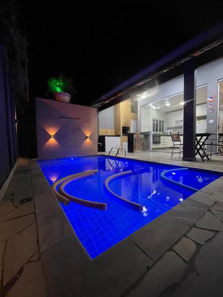 Auf dem Foto ist das Objekt Pousada Riviera & Itaguaré com piscina climatizada! in der Stadt Bertioga zu sehen.