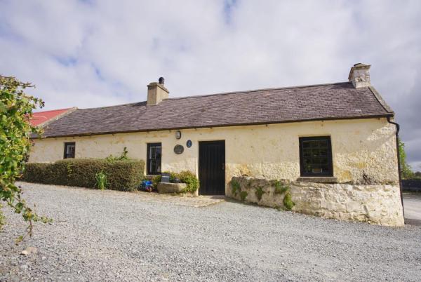 A la foto es mostra l'objecte George's Cottage situat a la ciutat de Brackenagh.