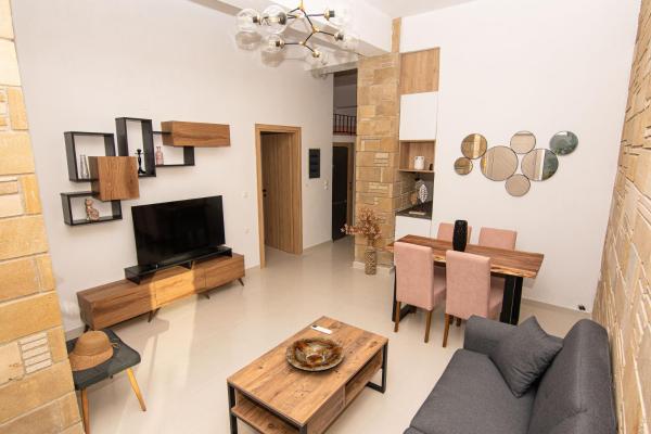 A la foto es mostra l'objecte Rikanthos Stone Sea View Apartment ΙΙ situat a la ciutat de Kotsianá.