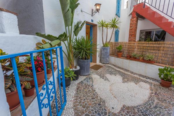 Nella foto è visibile l'oggetto Cute Andalusian townhouse with terrace and views. situato nella città di Mijas.