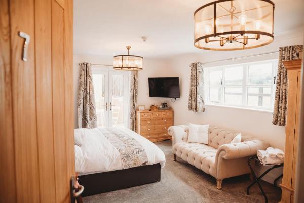Op de foto is het object Woodlands - All rooms ensuite, Activity room & Hot Tub te zien, gelegen in de stad West Hatch.