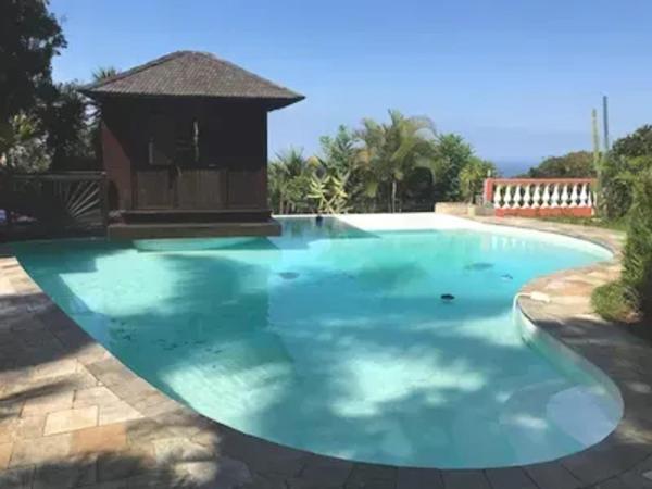 A la foto es mostra l'objecte Bungalow charmant avec jardin à Saint-Louis, piscine partagée situat a la ciutat de Fiague.