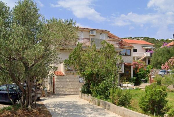 The photo shows the Apartments by the sea Tkon, Pasman - 21943 located in the city of Tkon.