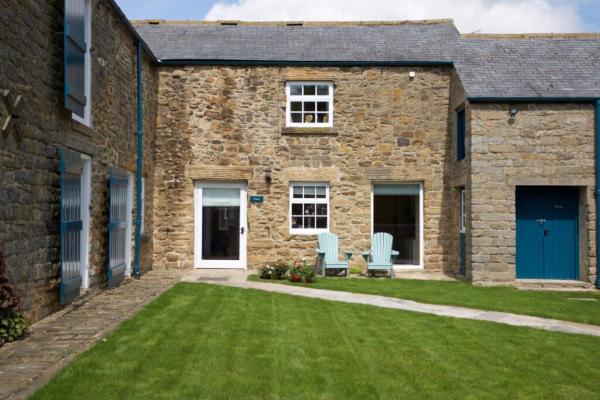 A la foto es mostra l'objecte Dunsa Cottage Bakewell Peak District situat a la ciutat de Edensor.