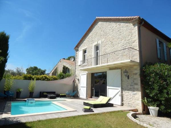 På billedet ses objektet Spacieuse maison de village avec piscine beliggende i byen Valflaunès.
