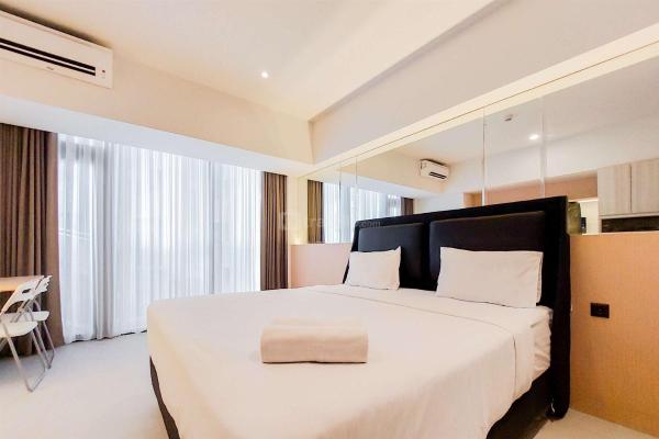 写真にはKramat市にあるFancy and Nice Studio Apartment Carstensz Residence By Travelioが写っています。