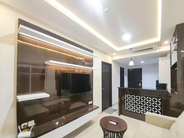 A la foto es mostra l'objecte Spacious and Elegant 1BR at Patraland Amarta Apartment By Travelio situat a la ciutat de Kejayan.