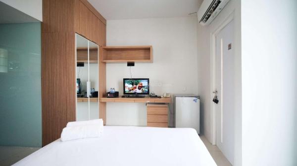写真にはWonokerto市にあるBest Choice and Homey Studio at The Square Surabaya Apartment By Travelioが写っています。