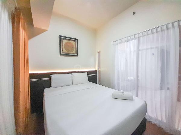 A la foto es mostra l'objecte Brand New and Good Simply 1BR at Uttara The Icon Apartment By Travelio situat a la ciutat de Kejayan.