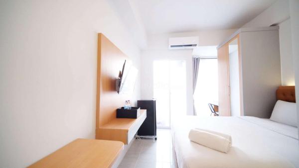 På bilden syns objektet Tidy and Cozy Stay Studio Apartment at Suncity Residence By Travelio som ligger i staden Sidoarjo.