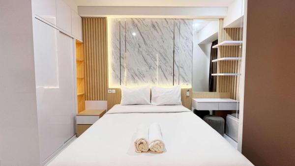 La photo montre l'objet Good Choice Studio at Delft Ciputra Makassar Apartment By Travelio situé dans la ville de Sungguminasa.