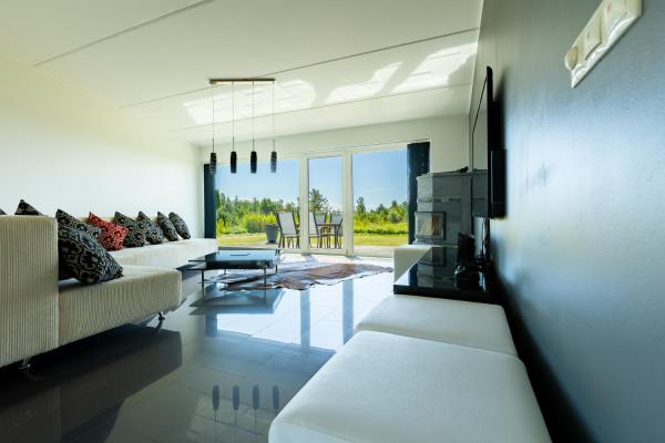 The photo shows the Päikeseline Apartment WITH SAUNA located in the city of Abruka.