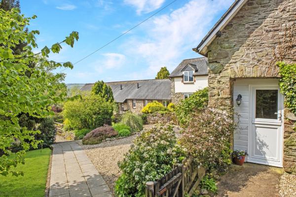 A la foto es mostra l'objecte Stable Cottage Wheddon Cross situat a la ciutat de Cutcombe.