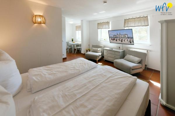 Na foto é possível ver o objeto Ferienhaus am Gutspark Drankse Ferienwohnung Sandglöckchen localizado na cidade de Dranske.