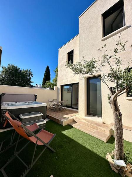 A la foto es mostra l'objecte Villa Paquerette avec spa situat a la ciutat de Nimes.
