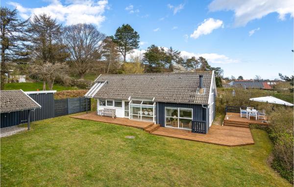 A la foto es mostra l'objecte Holiday Home Lyngsbækvej Ix situat a la ciutat de Ebeltoft.