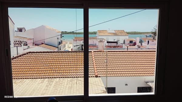 A la foto es mostra l'objecte CASA DE MARINEROS en LA RIA DEL ROMPIDO situat a la ciutat de Cartaya.